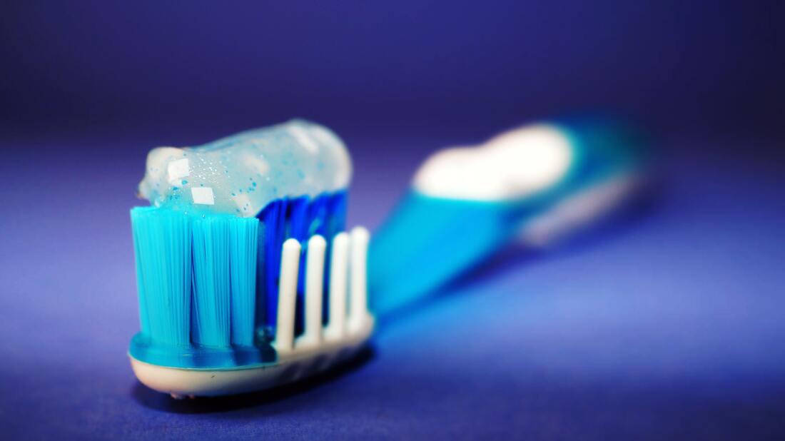 Picture of a toothbrush with toothpaste