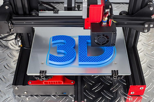 Picture of a 3D printer printing the words, 