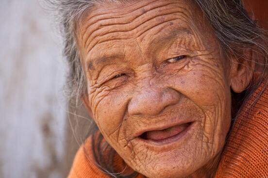 Picture of an elderly person with no teeth