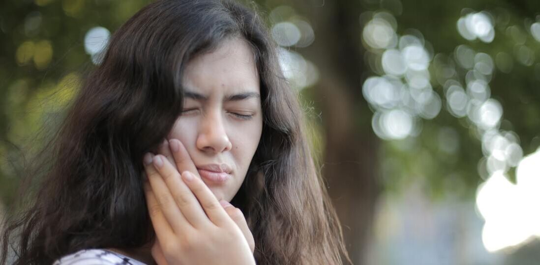 Picture of a girl having a toothache