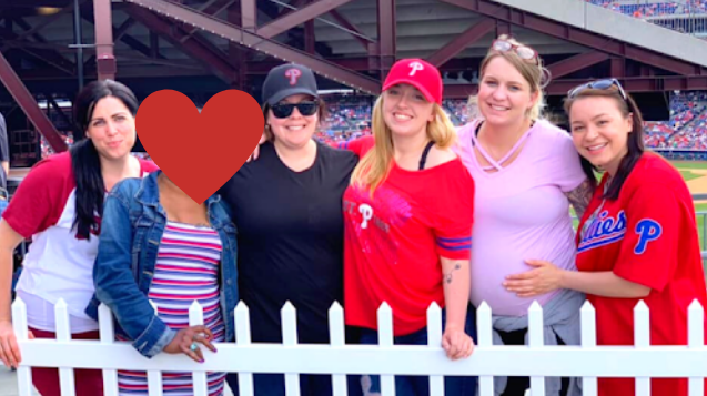 Picture of our team members at a Philly Baseball game.
